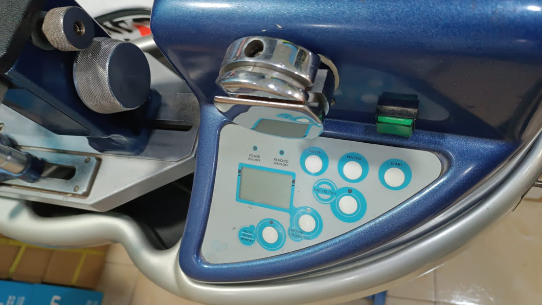 Máquina electrónica para encordar raquetas